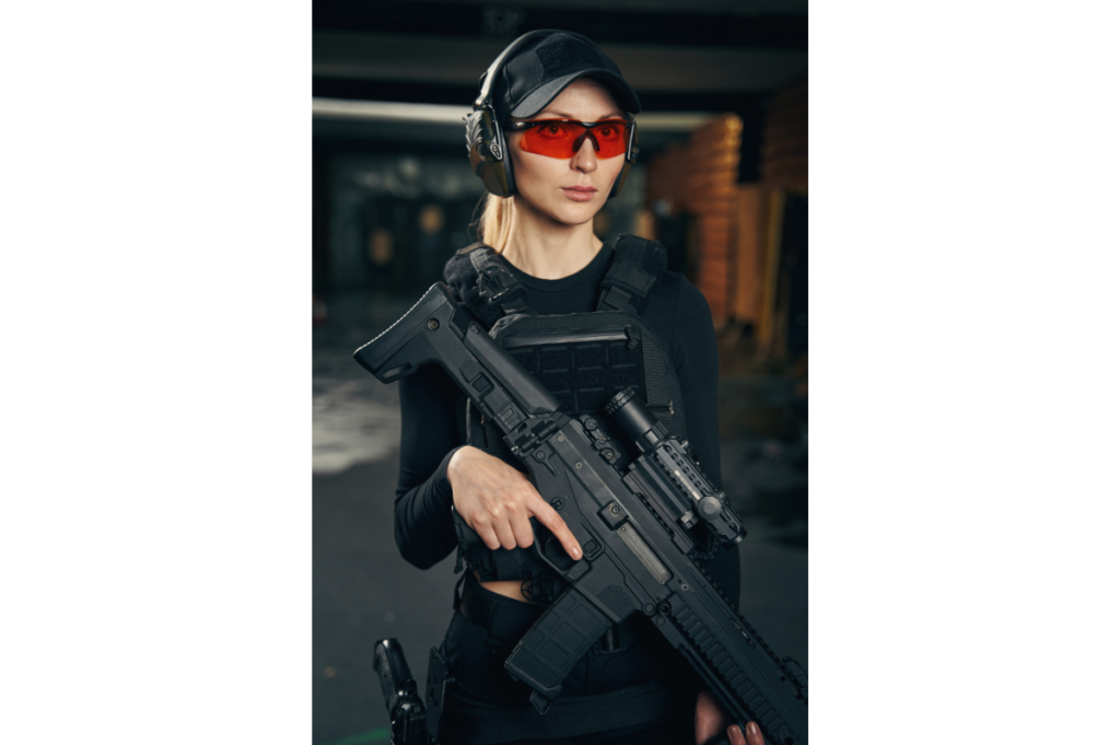 tactical girl holding rifle