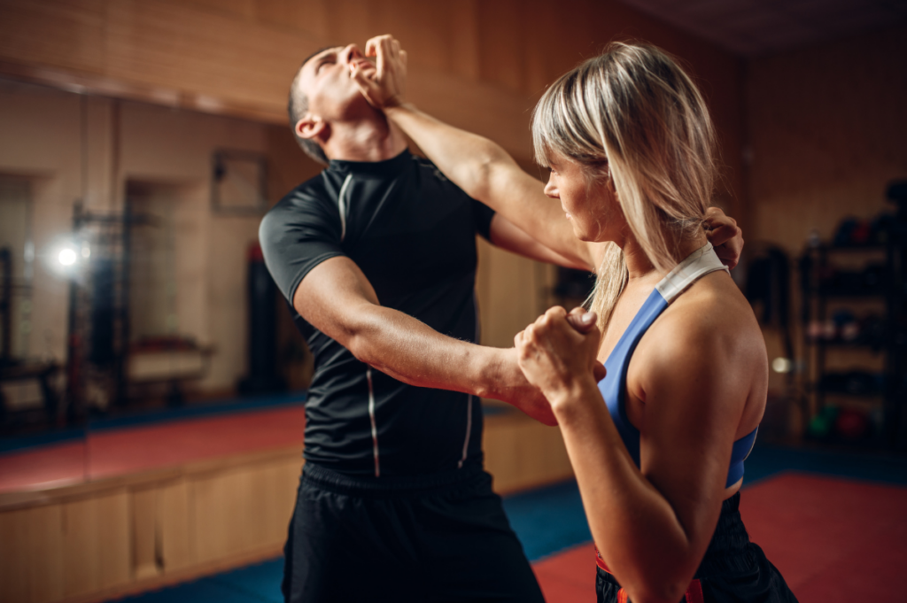 woman training self defense combat